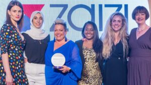 Zaizi staff picking up the Women in Tech award