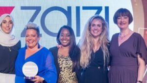 Zaizi staff picking up the Women in Tech award