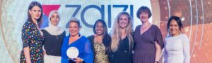 Zaizi staff picking up the Women in Tech award