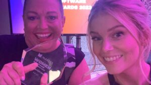 Tracey and Emily celebrating with the award